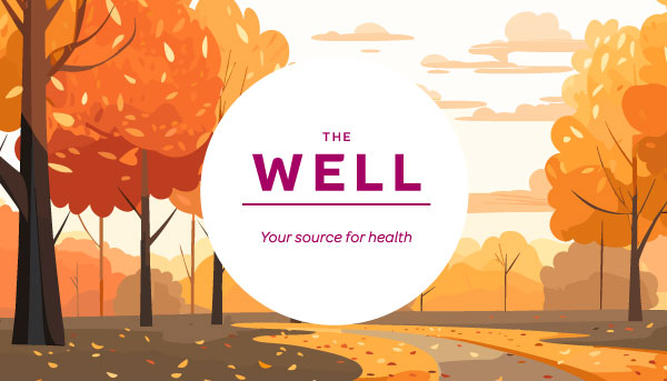 Fall trees with a logo for The Well, your source for health.