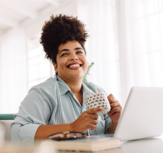 Women sitting at a computer learning about diabetes